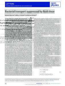 Bacterial transport suppressed by fluid shear
